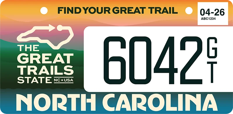 Great Trails State specialty plate design with mountain sunrise artwork